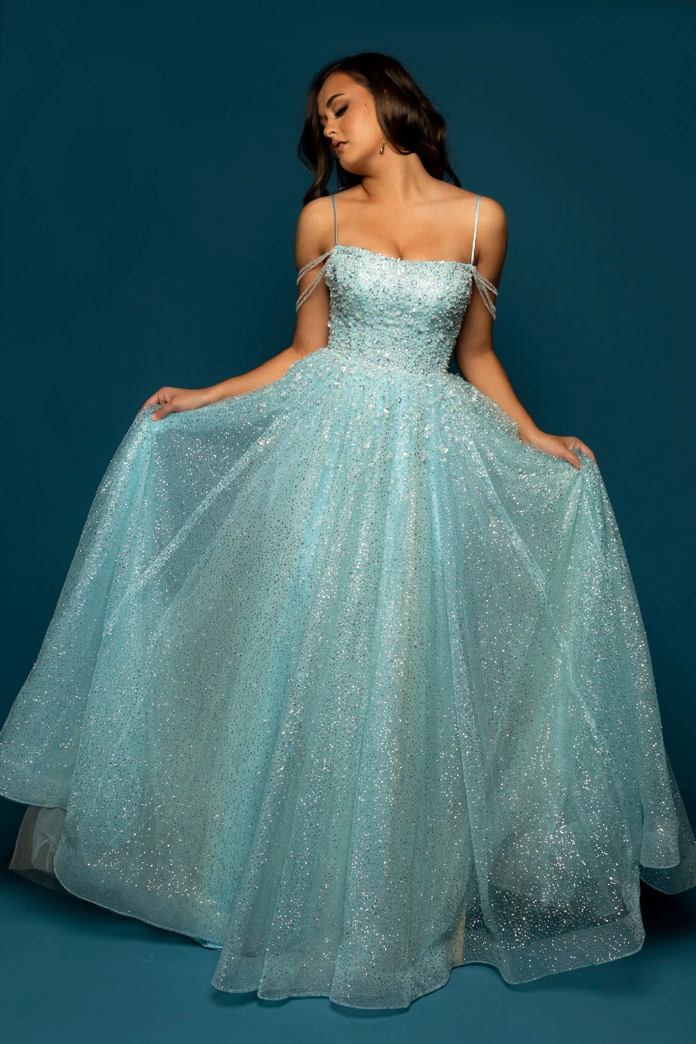 Sparkling baby blue princess dress with crescent moon neckline and crystal off the shoulders