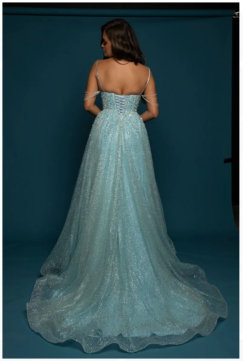 Sparkling baby blue princess dress with crescent moon neckline and crystal off the shoulders