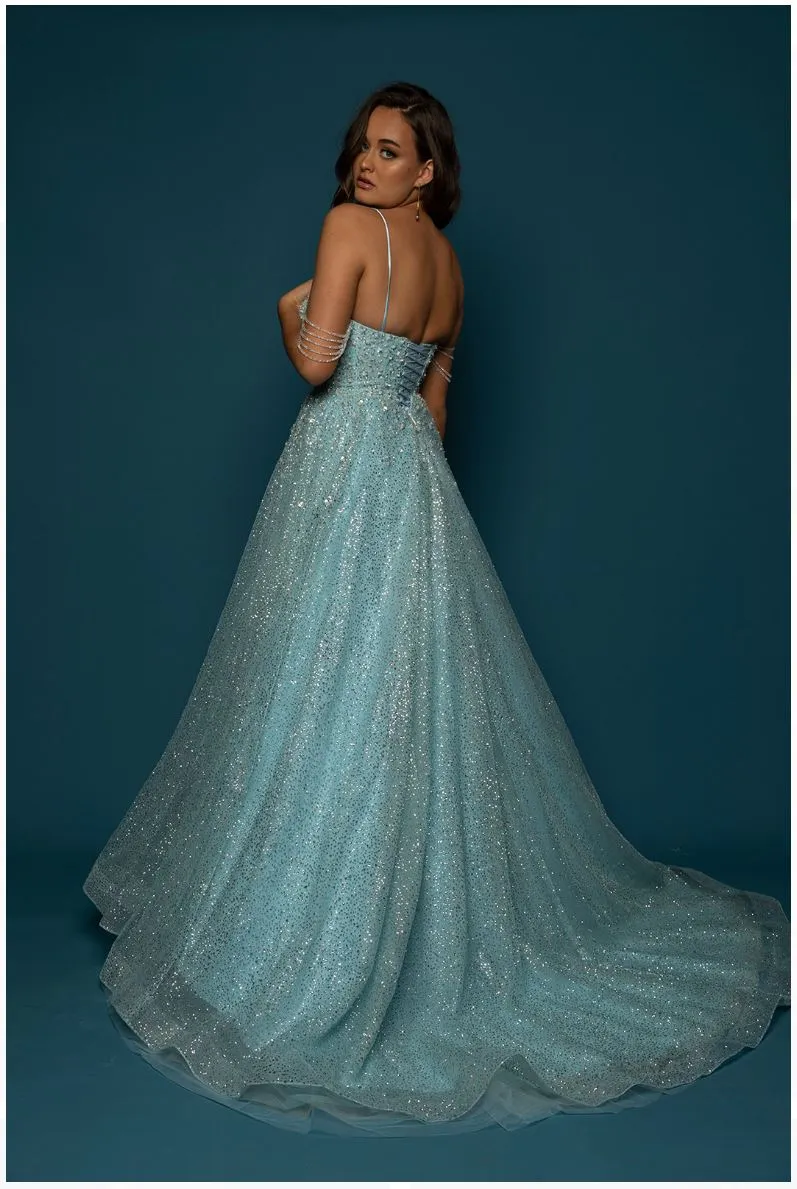 Sparkling baby blue princess dress with crescent moon neckline and crystal off the shoulders