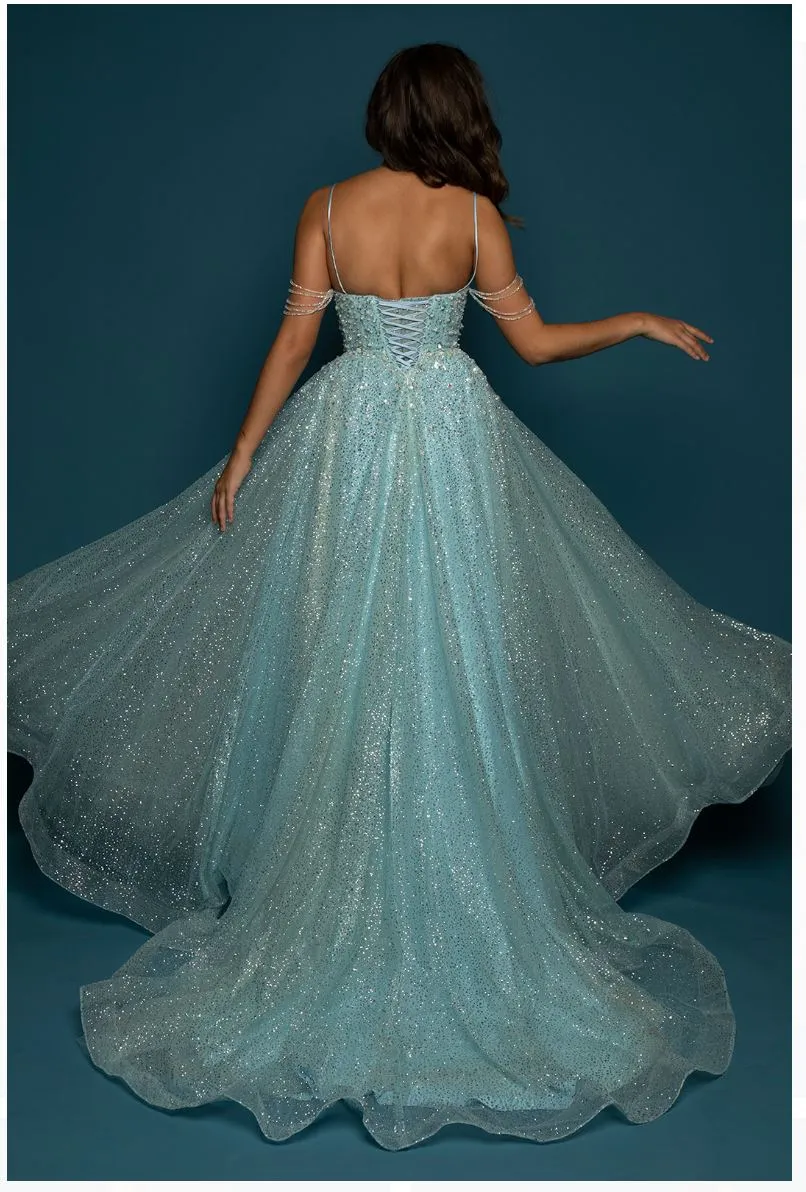 Sparkling baby blue princess dress with crescent moon neckline and crystal off the shoulders