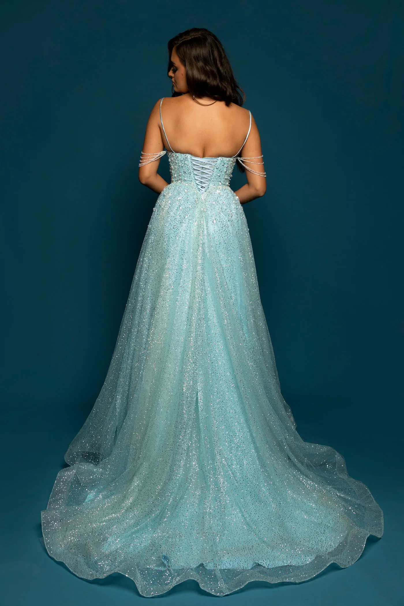 Sparkling baby blue princess dress with crescent moon neckline and crystal off the shoulders